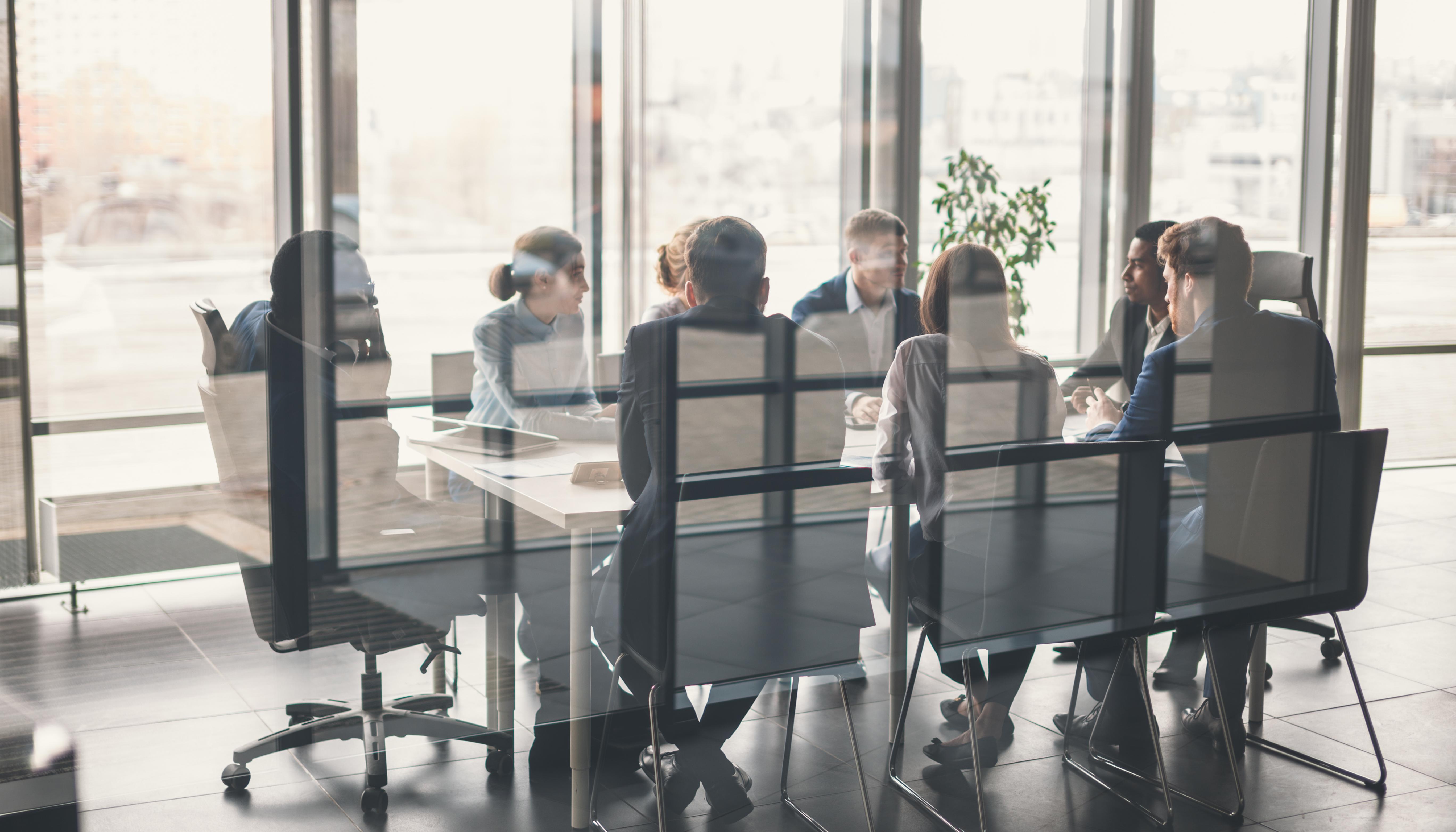 people at meeting table